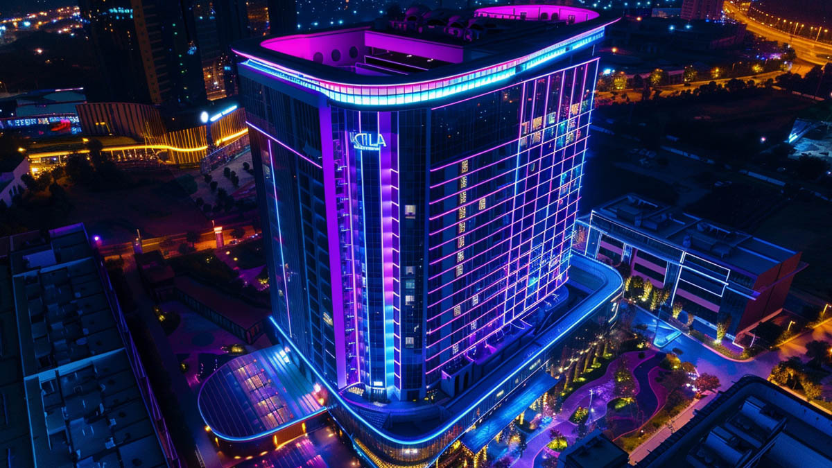 DMX facade lighting applied to commercial building with synchronized RGB lighting effects in outdoor environment